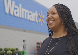 Woman stands outside Walmart
