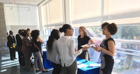 job seekers at booth