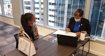 female candidate interviewing at hiring fair