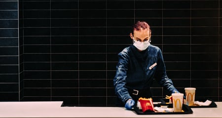 mcdonald's worker with tray