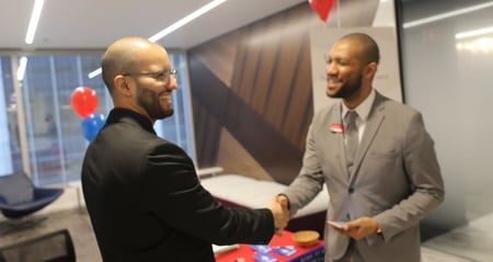 job seeker shaking hands with Bank of America hiring manager