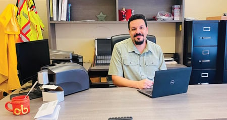 Miguel works at his desk at Motivate, LLC (Divvy)